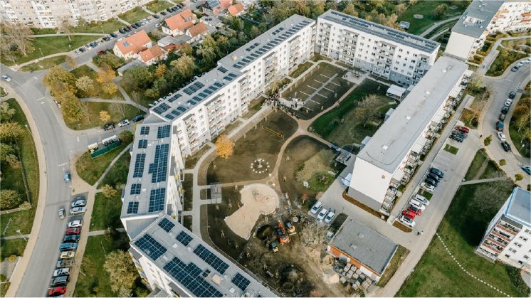 Foto 1 Moderne Wohnungen, PV Anlagen und Klima-Garten.JPG