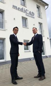 Mr. Takahiro Shimizu, TOYO Corporation, Japan and Benjamin Strube, mediCAD Hectec, Germany