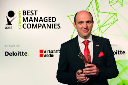 Thomas Eschey mit dem "Axia Best Managed Companies Award"