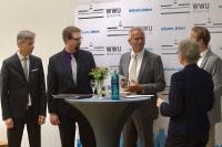 Ralph Weidling (Mitte) bei der Verleihung des Transferpreises 2018. Bildnachweis: Brigitte Heeke, AFO-WWU