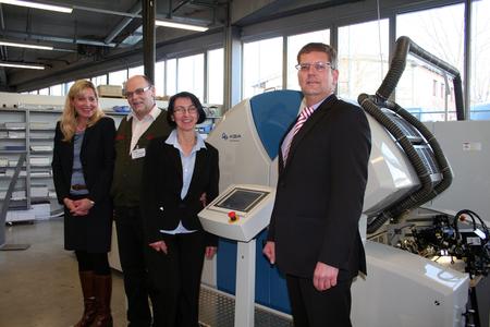 Happy faces at the printing centre of KBA-MePrint in Veitshöchheim: order received! Martina Mejzlikova, Regional Sales Director KBA-MePrint, Wieslaw Dziaduszek and wife, Management of Paper & Board with Holger Volpert, CEO KBA-MePrint AG (left to right).