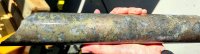 Plate 1: Core sample from ST2606 at 80.9 m showing chalcopyrite, pyrrhotite and arsenopyrite in a quartz shear vein, returning 0.4 m @ 6.5 g/t Au, 66.4 g/t Ag and 1.35% Cu. Core size is NQ2 (diameter 55.6 mm).