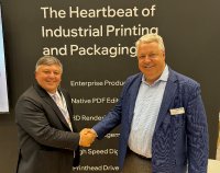 Mike Rottenborn, CEO of Hybrid Software, and Pierre Hammond, commercial director of Hamillroad Software, celebrate their new partnership
