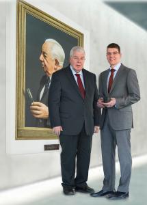 (from left) Dr Dieter Kress (President) and Dr Jochen Kress (Member of the Executive Board) in front of a painting that depicts the company founder Dr Georg Kress