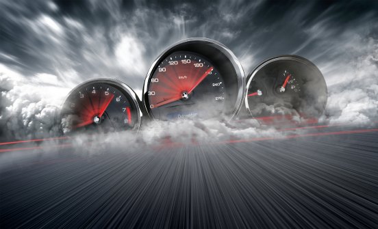 Speedometer-scoring-high-speed-in-a-fast-motion-blur-racetrack-background.-Speeding-Car-Backgrou.jpg