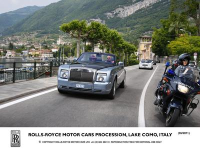 Italian Carabinieri support Rolls-Royce procession on Lake Como