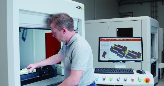 Weidmüller Klippon® Automated RailLaser system: Technology demonstrator for fully-automatic labelling of assembled terminal blocks. The operator only should insert the assembled terminal block, which is then permanently labelled via laser