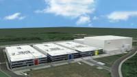 The picture shows the new building no. 3 with production area and office workstations as well as the new logistics center (right) at Karlstein