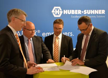 Dirk van Vinckenroye, Executive VP Industry Automation & Solutions at Weidmüller; Drew Nixon, Chief Operating Officer Global Sales at HUBER+SUHNER; Detmar Saalmann, Global Industry Development Manager Transportation at Weidmüller and Patrick Riederer, Chief Operating Officer Low Frequency at HUBER+SUHNER at InnoTrans 2016 in Berlin.