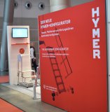 LogiMAT 2023: Der HYMER-Online-Konfigurator für Treppen, Plattformen und Wartungsbühnen. Messebesucher sind eingeladen, ihn zu testen und sich von den Experten fachkundig beraten lassen. 