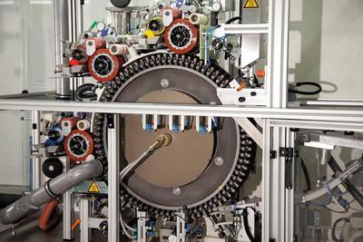 Rotoprint" – 3 colours with 3 "RTI 21-150" Rotary tampon printing units and a cooled wheel eliminates register inaccuracies caused by heating
