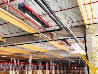 Fair.AIdH-Technologie FUTURA: die hocheffizienten Multi-Energie-IR-Heizungen sorgen im Logistikhallenneubau von GROUP7 am Standort Schwaig für angenehme, zug- und staubfreie Wärme – nahezu Carbon free. (Quelle: KÜBLER GmbH Energiesparende Hallenheizungen)