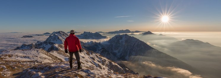 Startseite_Mann_auf_Berg-Gipfel_2018.jpg