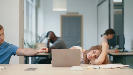 tired-woman-sleeping-with-notebook-coworking-office.jpg
