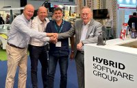 Guido Van der Schueren, Olivier Moeyersoms, & Pascal Pernot of Hybrid Software ring the bell to celebrate a new order with Christophe Seguin, Managing Director of ELC Etiquettes