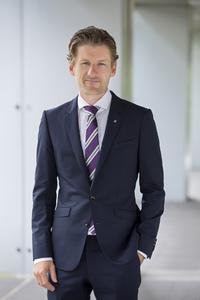 Dr. Andreas Hauser