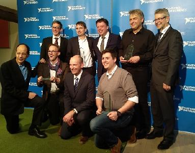 Pleased about the award (l. to r., back to front): Ingo Schumacher (National Instruments), Dr. Gerd Schmitz (S.E.A. Data Technology GmbH), Georg Plasswilm (National Instruments), Michael Konrad (Konrad Technologies GmbH), Michael Dams (National Instruments), Tony Vento (National Instruments), Frank Heidemann (SET GmbH), Robert Morton (National Instruments), and Josef Eiswirt (measX GmbH & Co. KG).