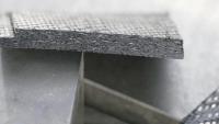 Carbon fibre reinforced plastic cut with a resonant ultrasonic system