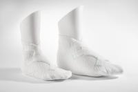 Pedilay® Care GmbH & phoenix GmbH & Co. KG: Innovatives Verbandsmaterial trifft auf maßgeschneiderte Fußmodelle aus dem 3D-Drucker.