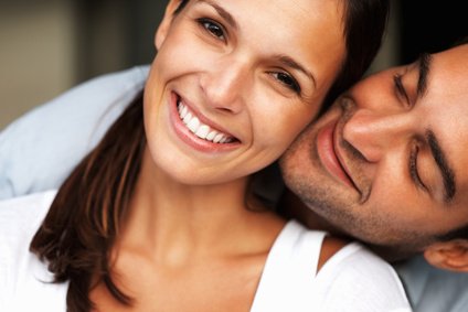 Embracing love Pretty woman smiling while man cuddles her - togethermedien.net.jpg