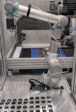 Modulare Roboterzelle als Nachrüstoption für UP-Fräsmaschinen LT-Ultra MMC900. Direktbestückung von Scanner-Polygonen aus Magazin.