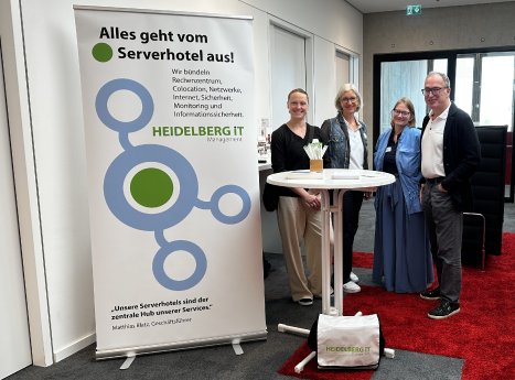 Regionalkonferenz MRN - Matthias Blatz mit einem Teil des Teams am Stand der Heidelberg iT.jpg