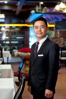 Herr Liu, portugiesisches Restaurant St. Louis in Xi`an, China