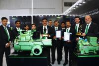 The BITZER team with the two award-winning compressors (Photo: BITZER)