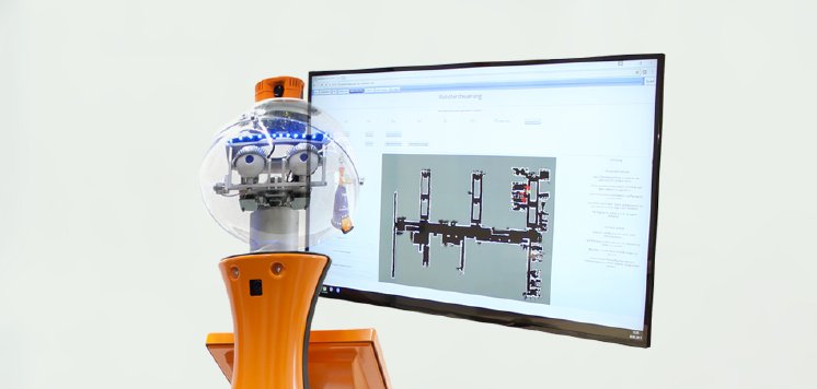TecArt-Customer-Robotiks-Management_ Roboter-mit-TecArt-Eingabeoberfläche-im-Hintergrund.jpg