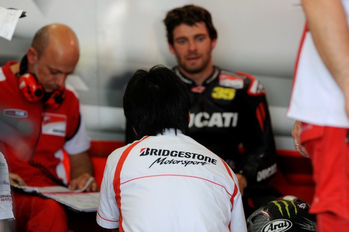 Bridgestone Motorsport engineer in Ducati Team box.jpg
