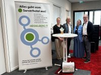 Geschäftsführer Matthias Blatz mit (v.l.) Felicitas Völkel (Projektleitung), Cornelia Luther (PR) und Patricia Küsterarent (Informationssicherheitsbeauftragte) am Stand der Heidelberg iT auf der Regionalkonferenz „Wirtschaft trifft Verwaltung“ der Metropolregion Rhein-Neckar. Foto: Heidelberg iT