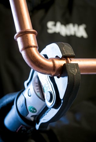Pressing tool on copper elbow.jpg