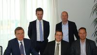 primion's new System Partner, DBM Banktechnik GmbH from Budapest with Managing Director Gábor Brunner, Technical Director Tamás Stadler and Head of Building Security Division Szabolcs Gecse (front row, l - r) signed a Partner Contract with primion. primion's Jürgen Dumont, CFO and Horst Eckenberger, CEO (back row, l - r) agreed firm goals with DBM