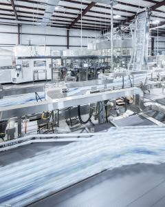 The first of the two InnoPET TriBlocks with a stretch blow molder, labeling module and filler (from right to left) is at the RealPure Bottling Company in Magee, Mississippi.
