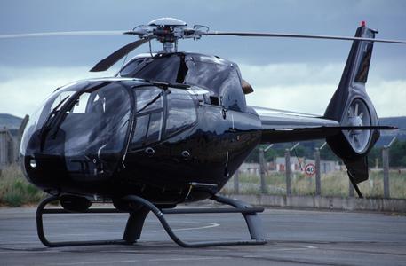 EC120B on ground is enclosed (© Copyright Eurocopter, Patrick Penna).