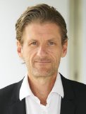 Dr. Andreas Hauser