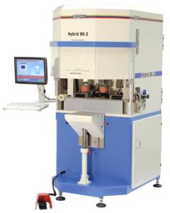 Interlinked process consisting of standard tampon printing machine, laser system and robot feeding