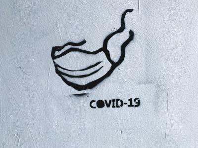 Covid 19 Graffiti mit Maske