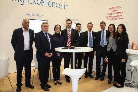 Jenoptik has sold a JENOPTIK-VOTAN® A laser perforating system to China, making it the 200th unit worldwide. from left: Mr. Dave Banse (YFV USA), Mr. Wolfgang Wittenbecher (JOAT), Ms. Xiling Wang (YFV China), Dr. Thomas Fehn (JOL), Mr. Yun Wang (YFV China), Mr. Heiz-Georg Geissler (JOAT), Mr. Martin Griebel (JOAT), Ms. Yuru Pan (YFV China), Ms. Jia Zhu (YFV China)