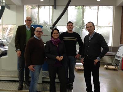 Genius 52UV at Stiels Werbedruck GmbH & Co. KG in Nettetal. Ralf Engels of Heinrich Steuber, Stefan Stiels, Managing Director of Stiels-Werbedruck, Sandra Ulsamer, Regional Sales Director KBA-MePrint, Sven Tappesser, printer at Stiels-Werbedruck, and Jakob Stiels, Managing Director at Stiels-Werbedruck (left to right)