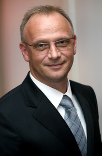 Frithjof Walk, AIM-Vorstandsvorsitzender