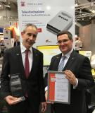 Freuen sich über den Innovationspreis-IT (von links): Gerald Richter und Paul Marx, die beiden Geschäftsführer der ECOS Technology GmbH