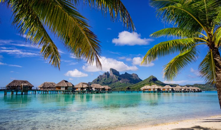 Overwater bungalows at Four Seasons Bora Bora Resort.jpg