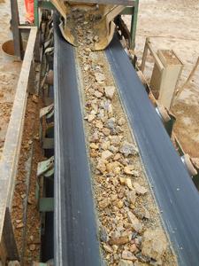 Clean material on conveyor