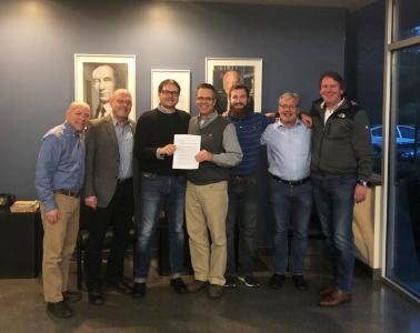 The teams of AMERICAN SpiralWeld Pipe and SMS group after contract signing