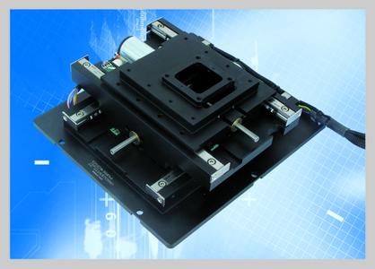 Integrated into a measuring unit, e.g. into a white-light interferometer, the M-900KOPS carries out precise XY-scans at high speed. A sample holder measuring 30 x 30 mm has been added here.