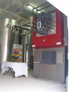 Wood heating for 590 housing units produced by one GILLES HPKI-K 2000 heating facility