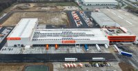 Luftaufnahme. Gebrüder Weiss hat sein Logistikzentrum bei Budapest um weitere 10.000 Quadratmeter erweitert. / Quelle: Gebrüder Weiss / Deák