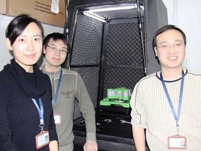 Professor Yi Cao, right, and two of his students with the JPK ForceRobot® system in the Institute of Biophysics at Nanjing University.