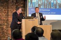 Die CURSOR-Vorstände Jürgen Topp (links) und Thomas Rühl eröffnen das CRM-Symposium 2014. Foto: S. Barthel, CURSOR